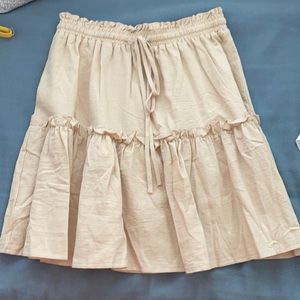 Tan flowy skirt!